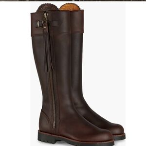 Penelope Chivler's Tassel Riding Boots